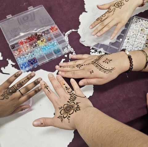 hands with henna art